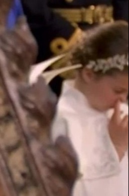 Moment fidgety Princess Charlotte is spotted playing with her nose during King Charles’ coronation – but did you notice?