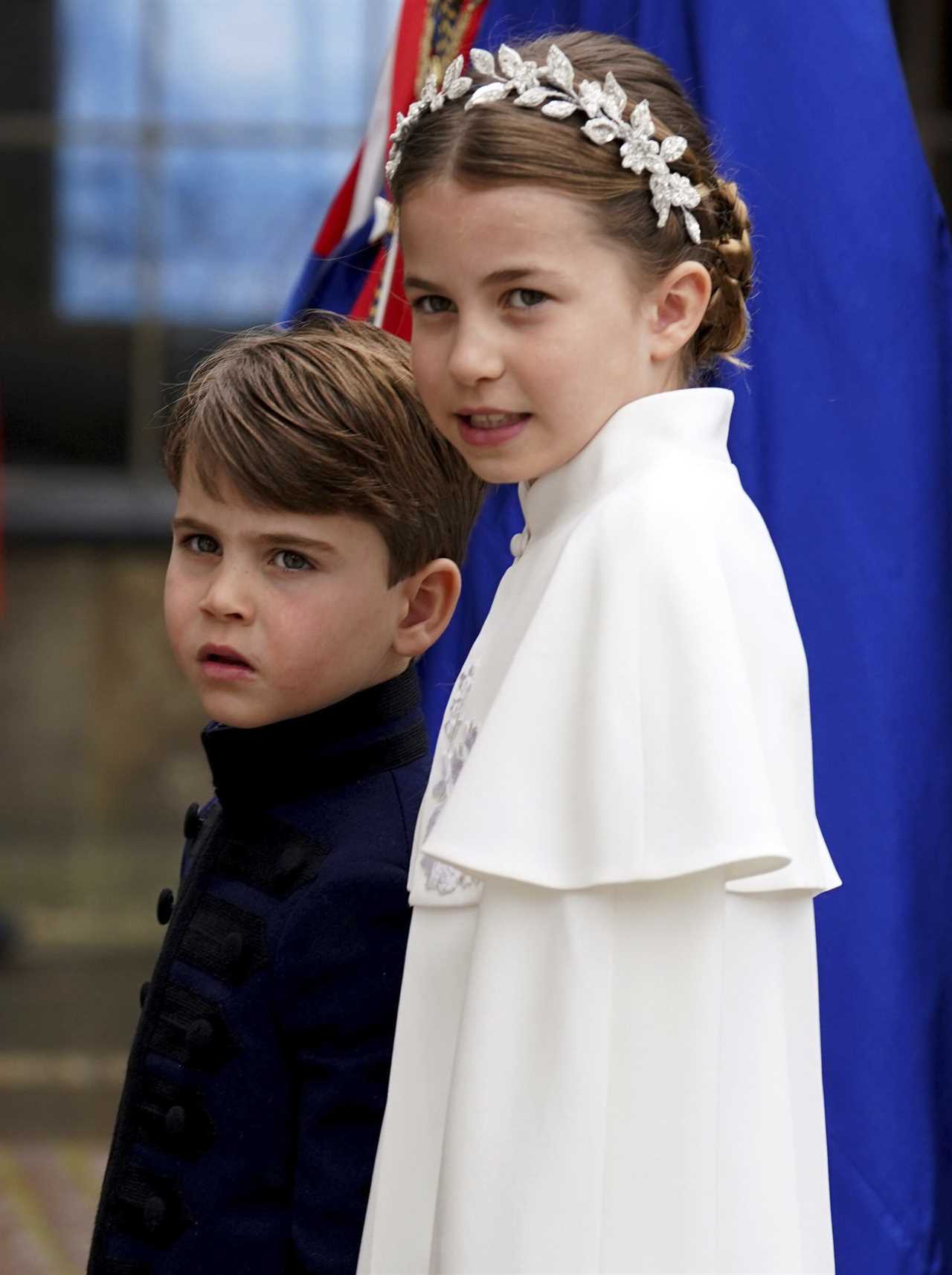 Moment fidgety Princess Charlotte is spotted playing with her nose during King Charles’ coronation – but did you notice?