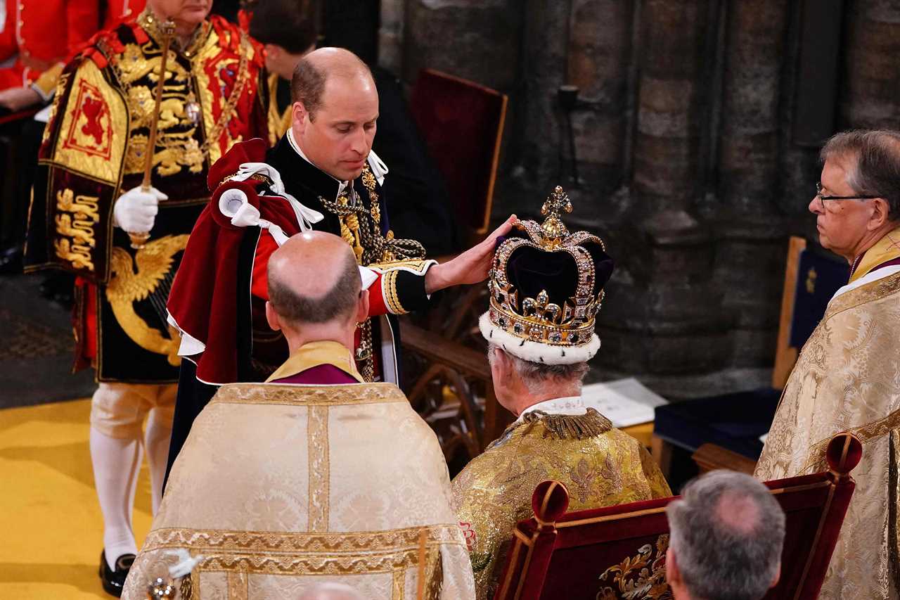 Prince William seals dad King Charles’ coronation with a kiss as he vows loyalty to his father