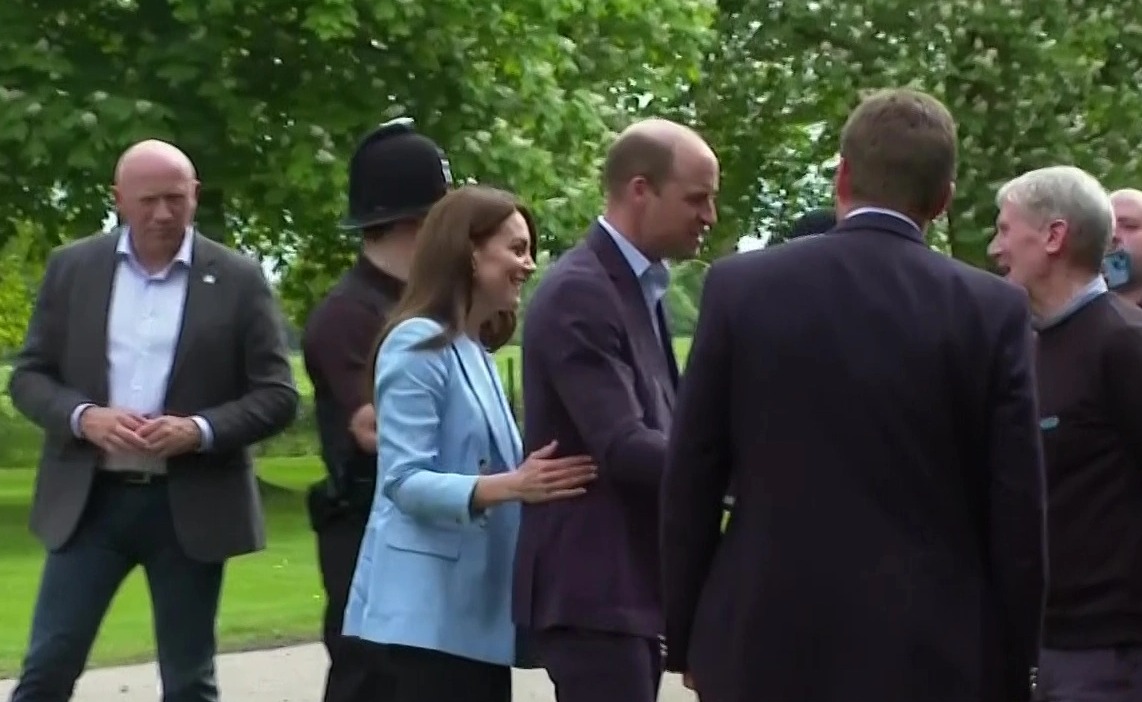 Princess Kate and Prince William beam as they greet Royal fans in surprise visit ahead of coronation concert