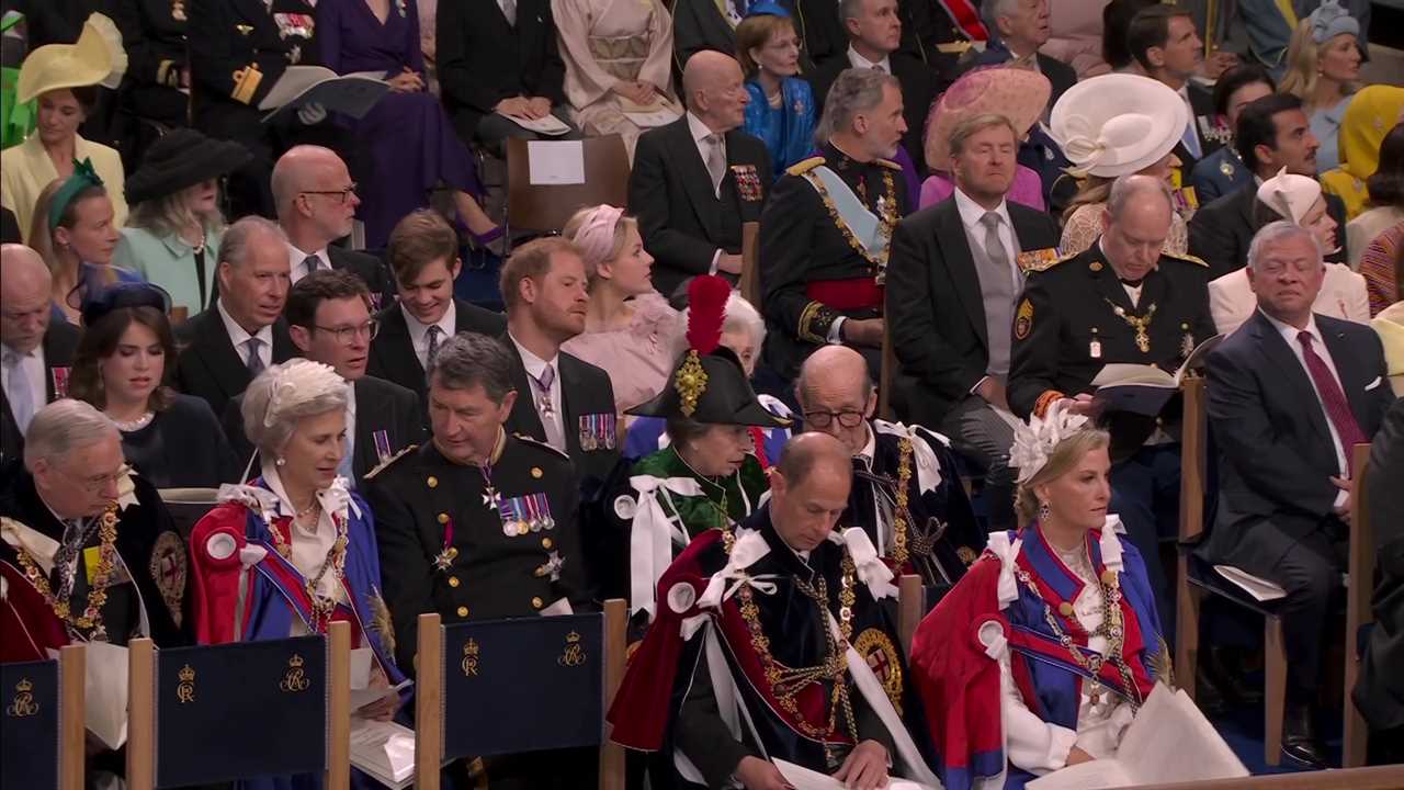 Prince Harry smiles despite sitting in third row after arriving separately from brother William at dad’s coronation