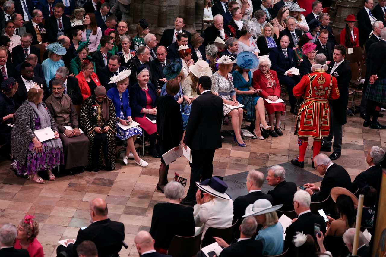 Prince Harry smiles despite sitting in third row after arriving separately from brother William at dad’s coronation