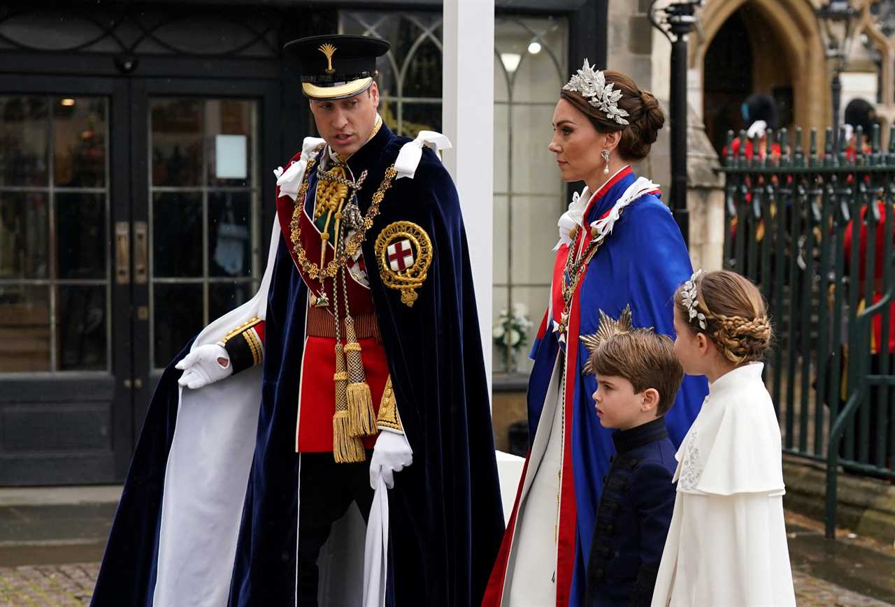 Cheeky Prince Louis, 5, steals the show as he makes a face next to big sister Charlotte, 8, at grandfather’s coronation