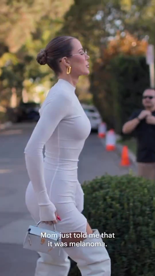 Khloe Kardashian puts her shrinking butt on display in skintight dress for racy new video after drastic weight loss