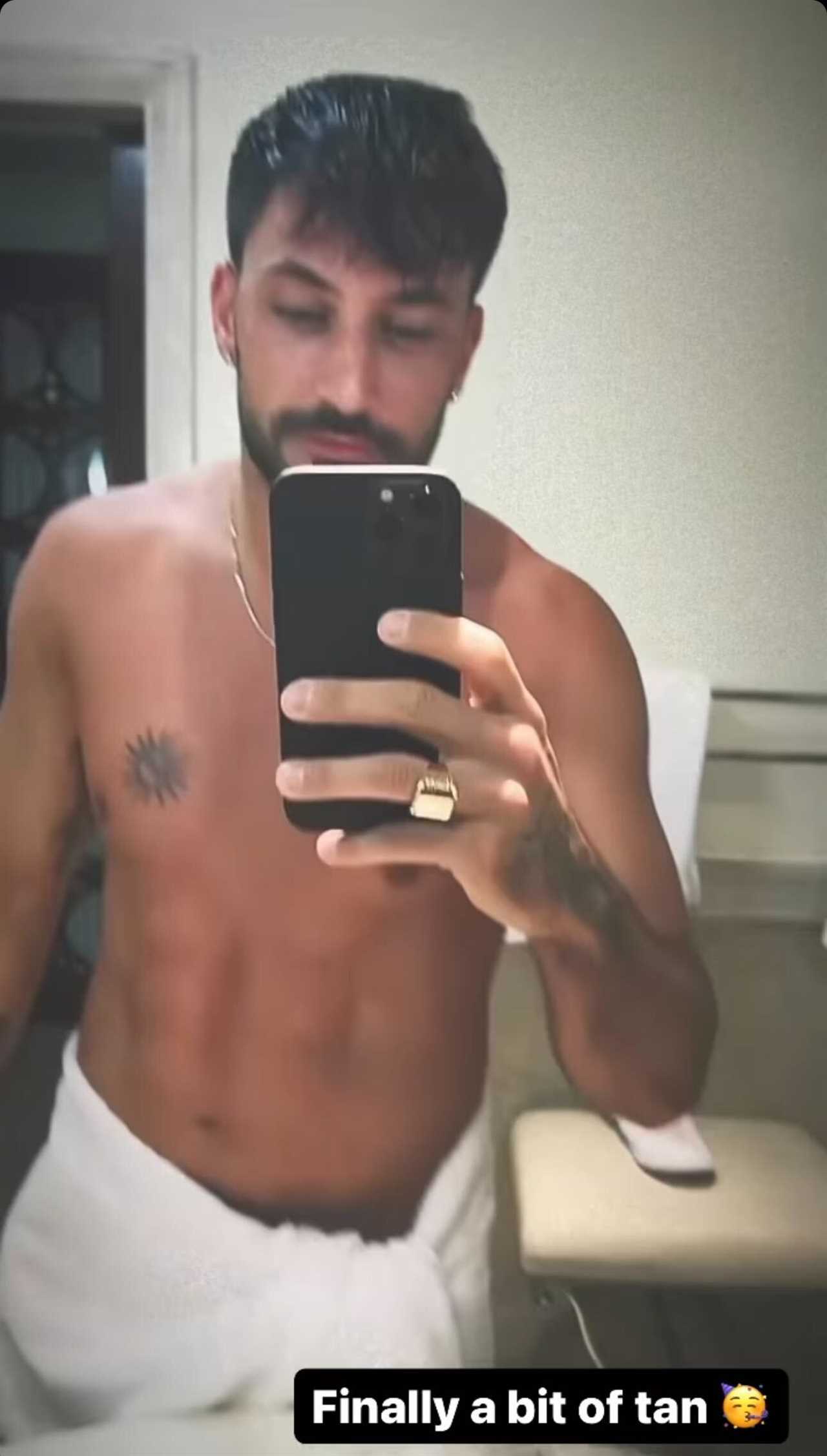 Strictly’s Giovanni Pernice has fans swooning as he shows off tanned six pack in nothing but a towel