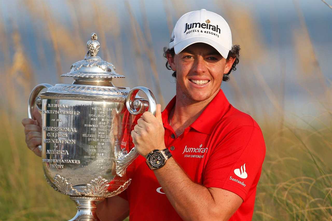 Rory McIlroy of Northern Ireland lifts the Wanamaker Trophy after capturing the PGA Championship at The Ocean Course on Kiawah Island, South Carolina, August 12, 2012. REUTERS/Mathieu Belanger (UNITED STATES – Tags: SPORT GOLF)