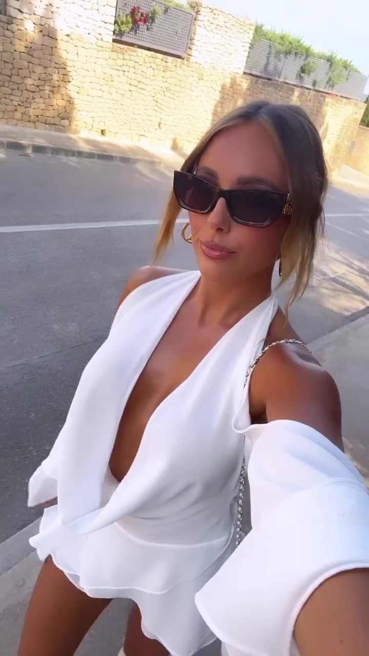 Towie’s Amber Turner goes braless in white dress as she shows Dan Edgar what he’s missing