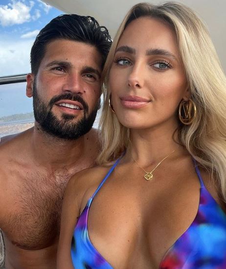 Towie’s Amber Turner goes braless in white dress as she shows Dan Edgar what he’s missing