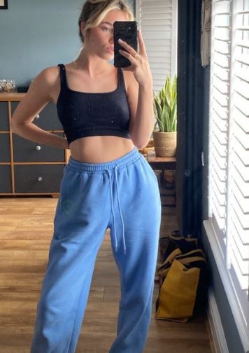 Love Island’s Lana Jenkins goes braless in crop top as she flashes her toned abs