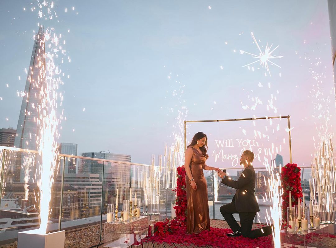 Apprentice winner engaged to co-star after stunning rooftop proposal