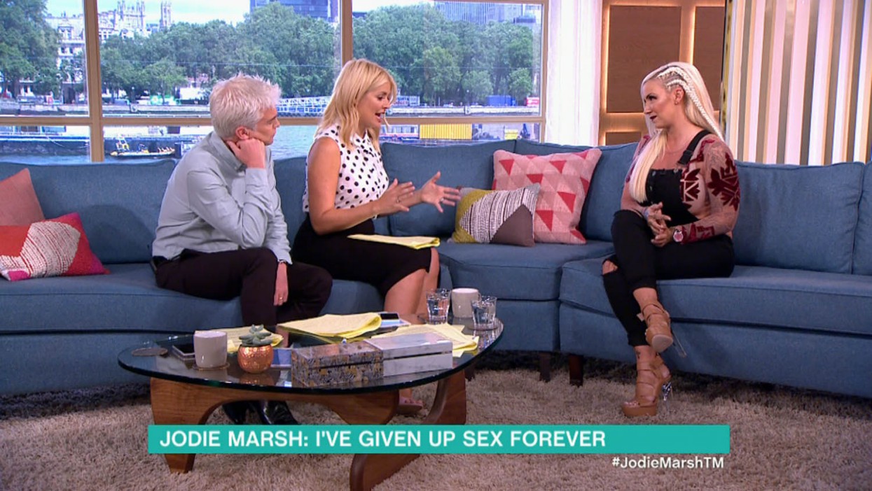 ****Ruckas Videograbs**** (01322) 861777 *IMPORTANT* Please credit ITV for this picture. 30/06/16 This Morning - ITV1 Grabs from this morning's show which saw Jodie Marsh being interviewed by Holly Willoughby and Phillip Schofield. Joide spoke about how she is looking for a sperm donor but has been put off men and given up sex forever. Viewers also noted how she had lipstick on her teeth. Office (UK) : 01322 861777 Mobile (UK) : 07742 164 106 **IMPORTANT - PLEASE READ** The video grabs supplied by Ruckas Pictures always remain the copyright of the programme makers, we provide a service to purely capture and supply the images to the client, securing the copyright of the images will always remain the responsibility of the publisher at all times. Standard terms, conditions & minimum fees apply to our videograbs unless varied by agreement prior to publication.