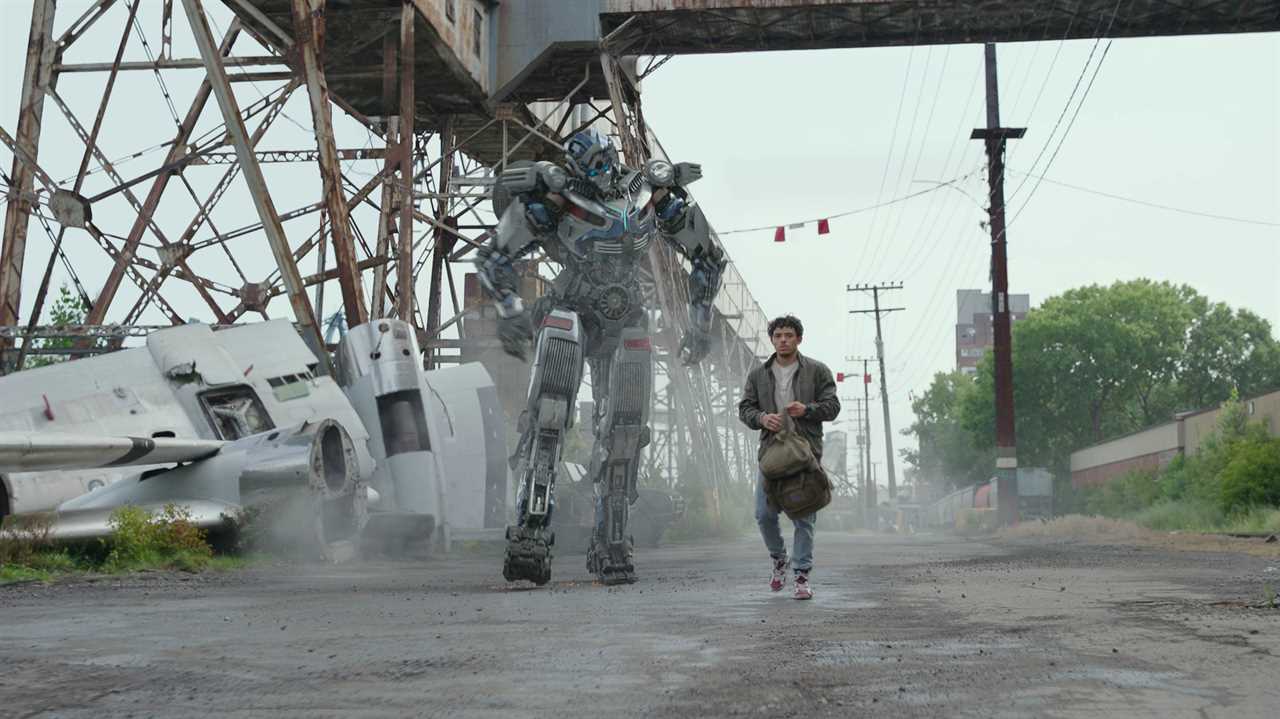 Undated film still from Transformers: Rise Of The Beasts. Pictured: Mirage (voiced by Pete Davidson) and Anthony Ramos as Noah Diaz. See PA Feature SHOWBIZ Film Reviews. WARNING: This picture must only be used to accompany PA Feature SHOWBIZ Film Reviews. PA Photo. Picture credit should read: Paramount Pictures. All Rights Reserved. Hasbro, Transformers and all related characters are trademarks of Hasbro. NOTE TO EDITORS: This picture must only be used to accompany PA Feature SHOWBIZ Film Reviews.