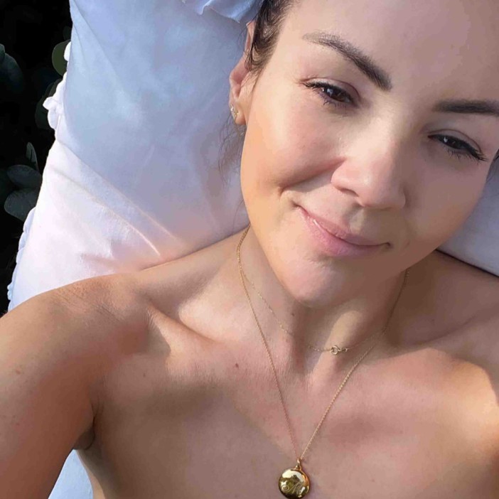Martine McCutcheon goes ‘topless’ while sunbathing as she reveals anxiety struggle