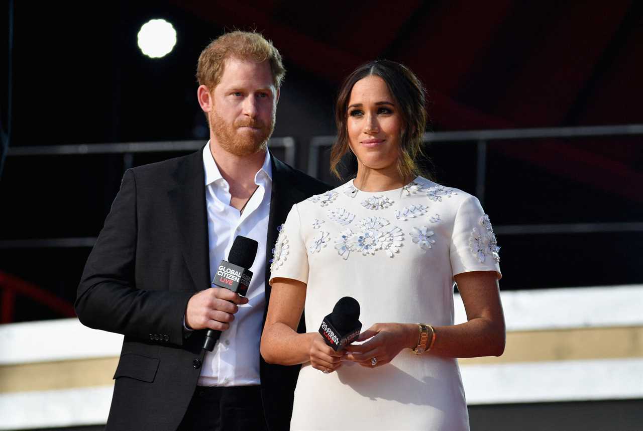 (FILES) Britain's Prince Harry and Meghan Markle speak during the 2021 Global Citizen Live festival at the Great Lawn, Central Park on September 25, 2021 in New York City. A multi-million-dollar deal between a media group run by Britain's Prince Harry and his wife Meghan Markle, and streaming giant Spotify is to end, a report said June 15, 2023. (Photo by Angela Weiss / AFP) (Photo by ANGELA WEISS/AFP via Getty Images)