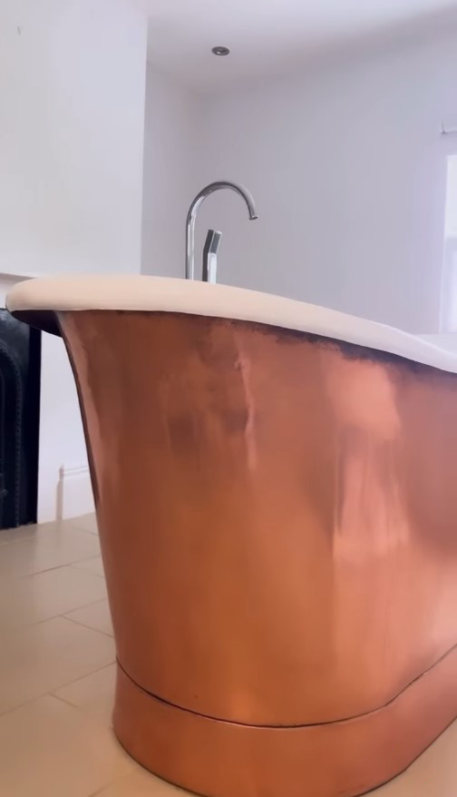 Towie’s Lydia Bright reveals huge free-standing copper bath as she renovates stunning new £1.5m home