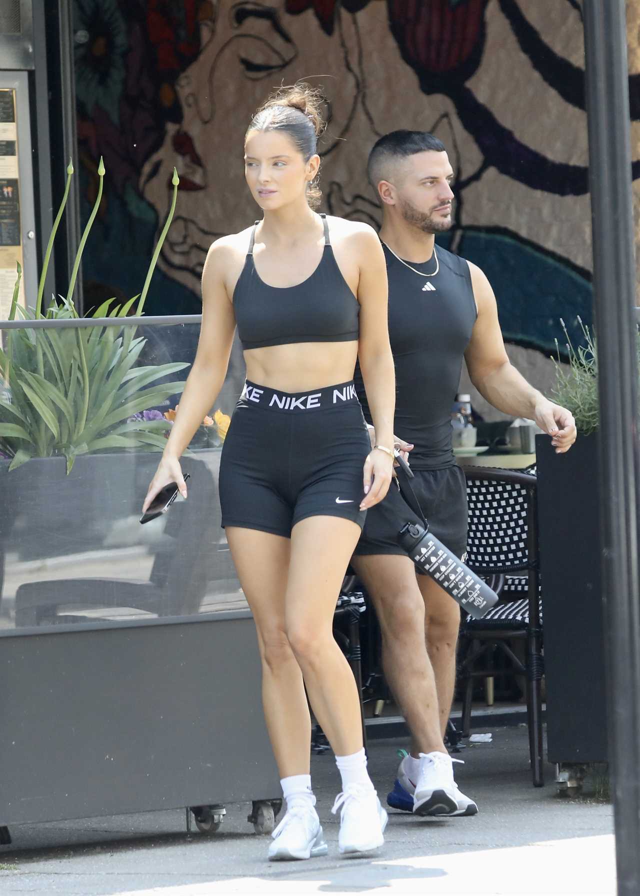 Love Island star Maura Higgins flashes abs in workout gear in Essex following terrifying raid