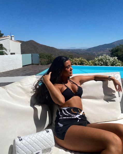 Inside glam off-camera life of bombshell Mal Nicol with jetsetting holidays and famous Love Island pals