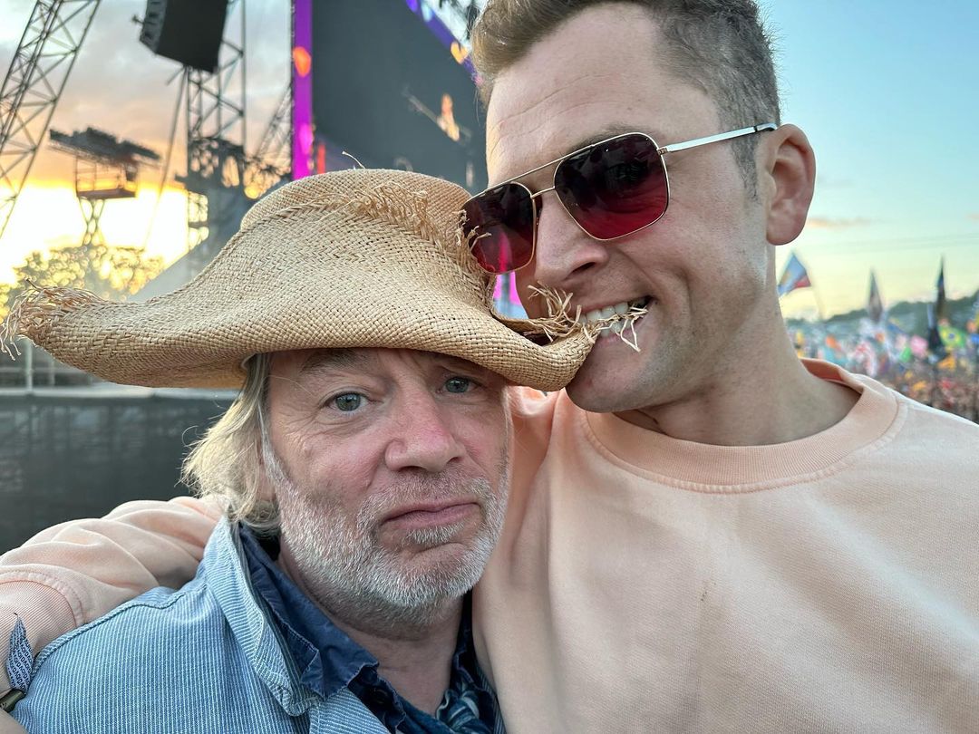 Nineties kids’ TV icon unrecognisable as he hangs out with Taron Egerton at Glastonbury