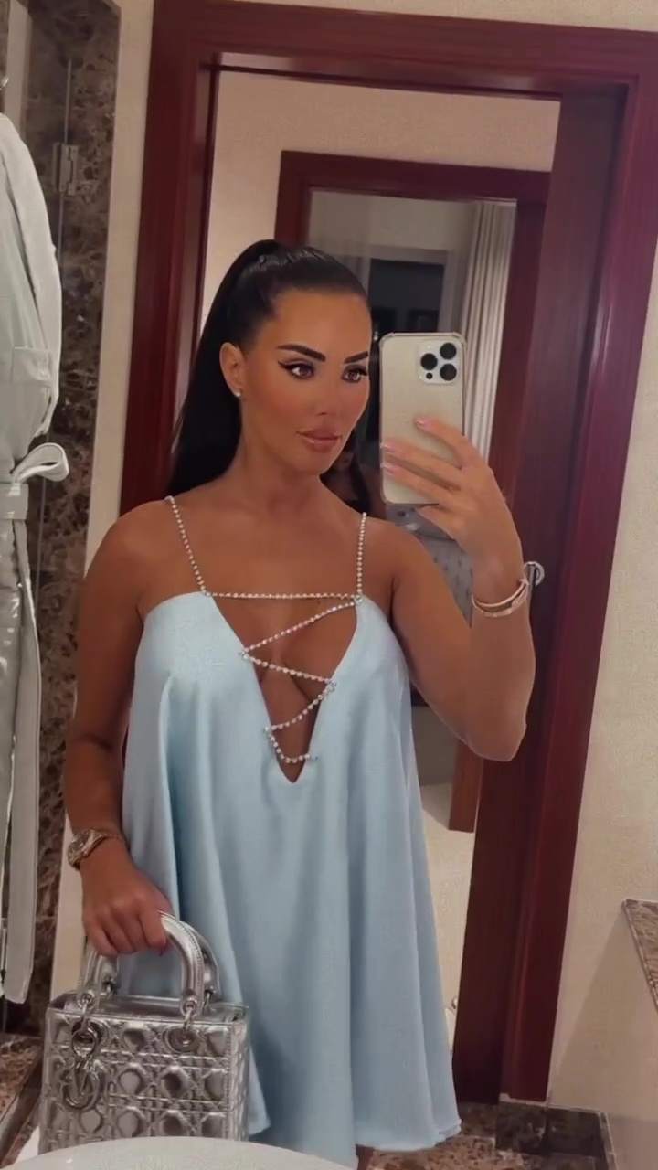 Towie’s Yazmin Oukhellou goes braless in plunging babydoll dress on glam night out