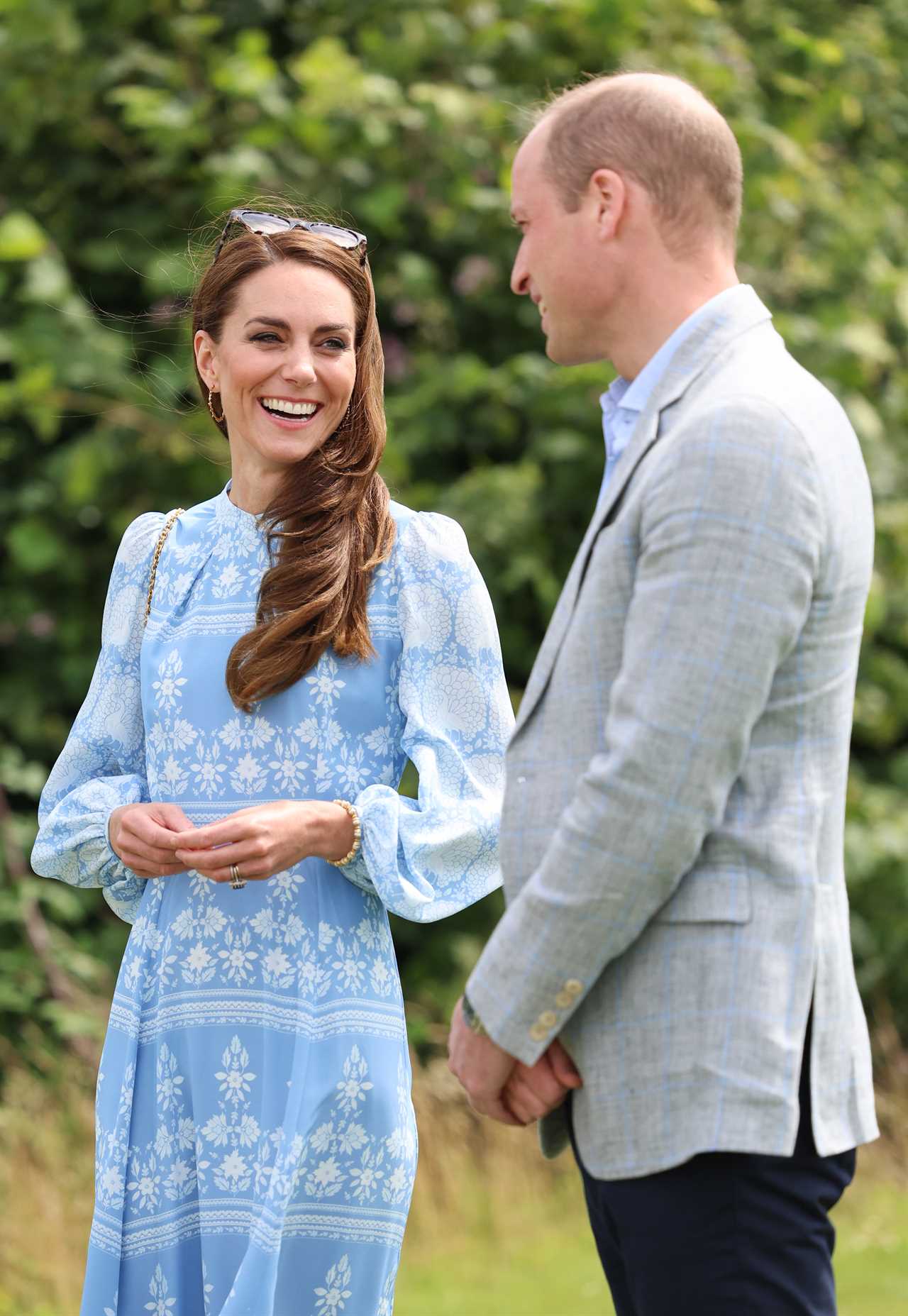 Princess Kate and Prince William look loved up as she cheers him on at charity polo match