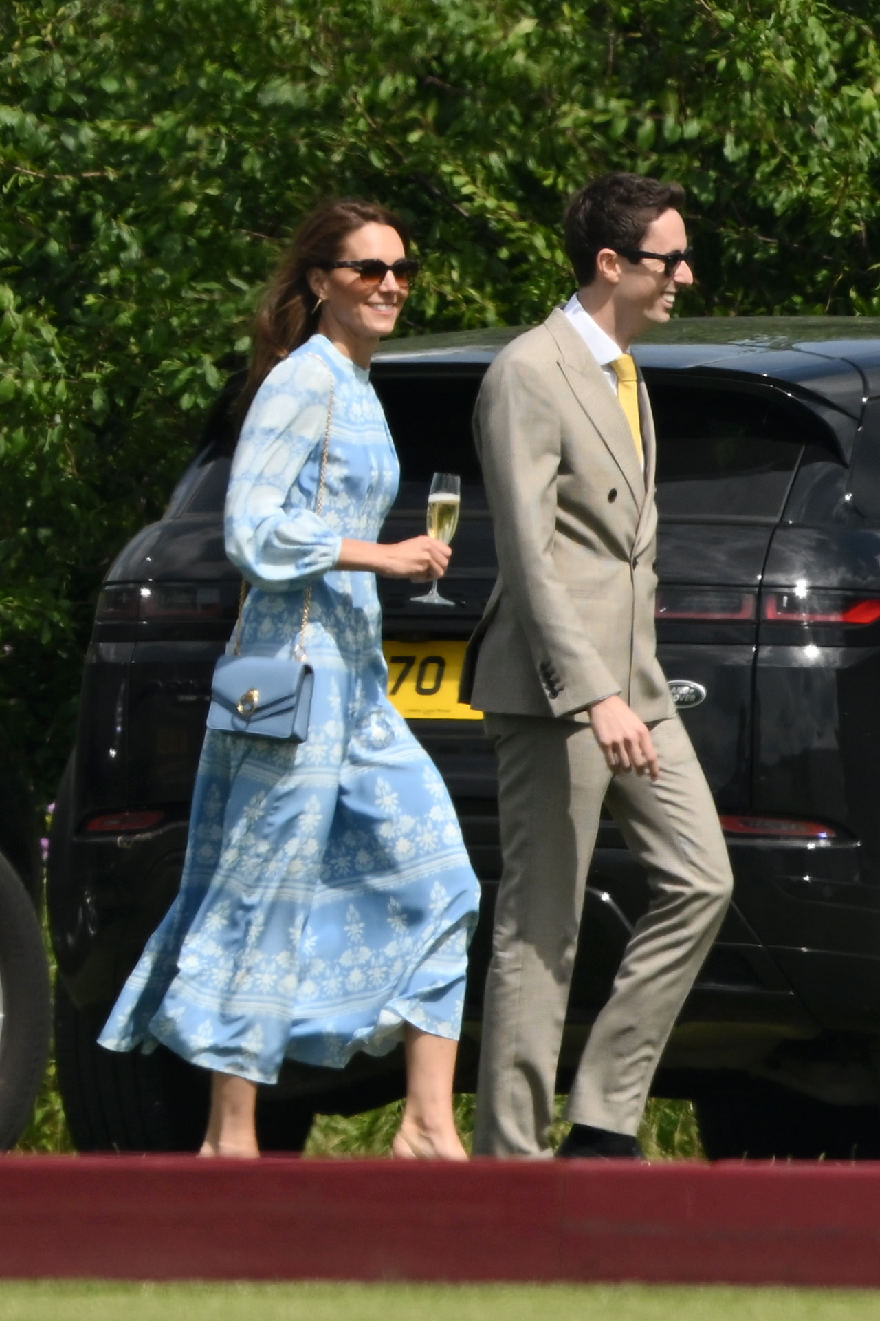 Princess Kate and Prince William look loved up as she cheers him on at charity polo match