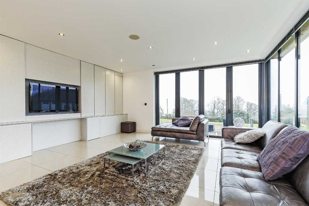 I grew up on a council estate – now I’m selling my Grand Designs house for an eye-watering sum after epic transformation