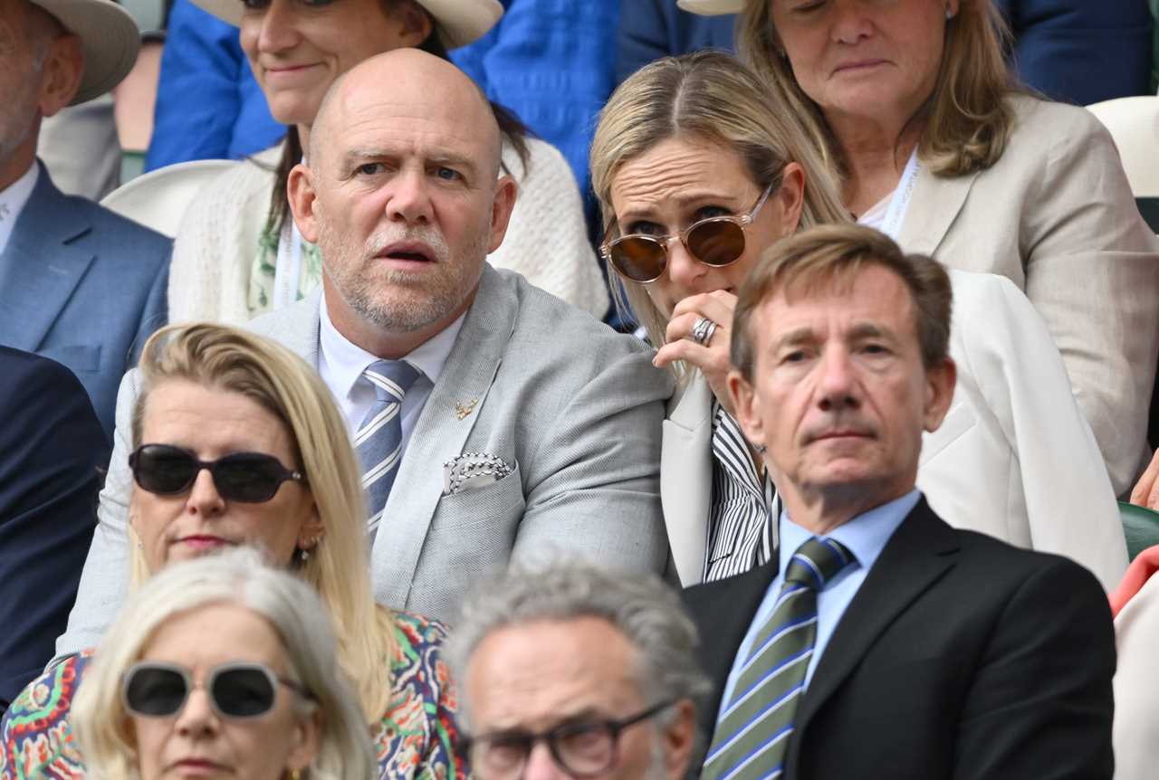 Zara and Mike Tindall share cheeky kiss as they put on a VERY cosy display at Wimbledon