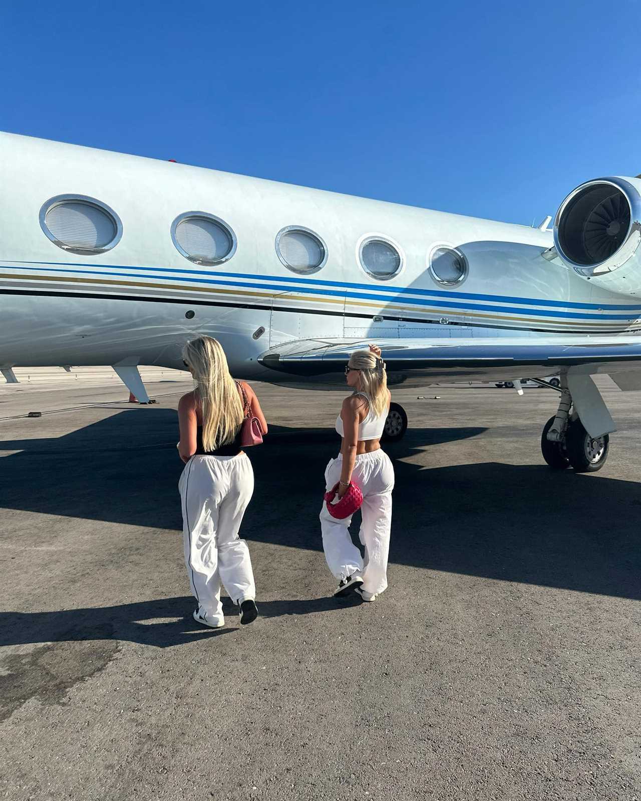 Love Island’s Ellie Brown wows in bikini as she boards private jet with co-star