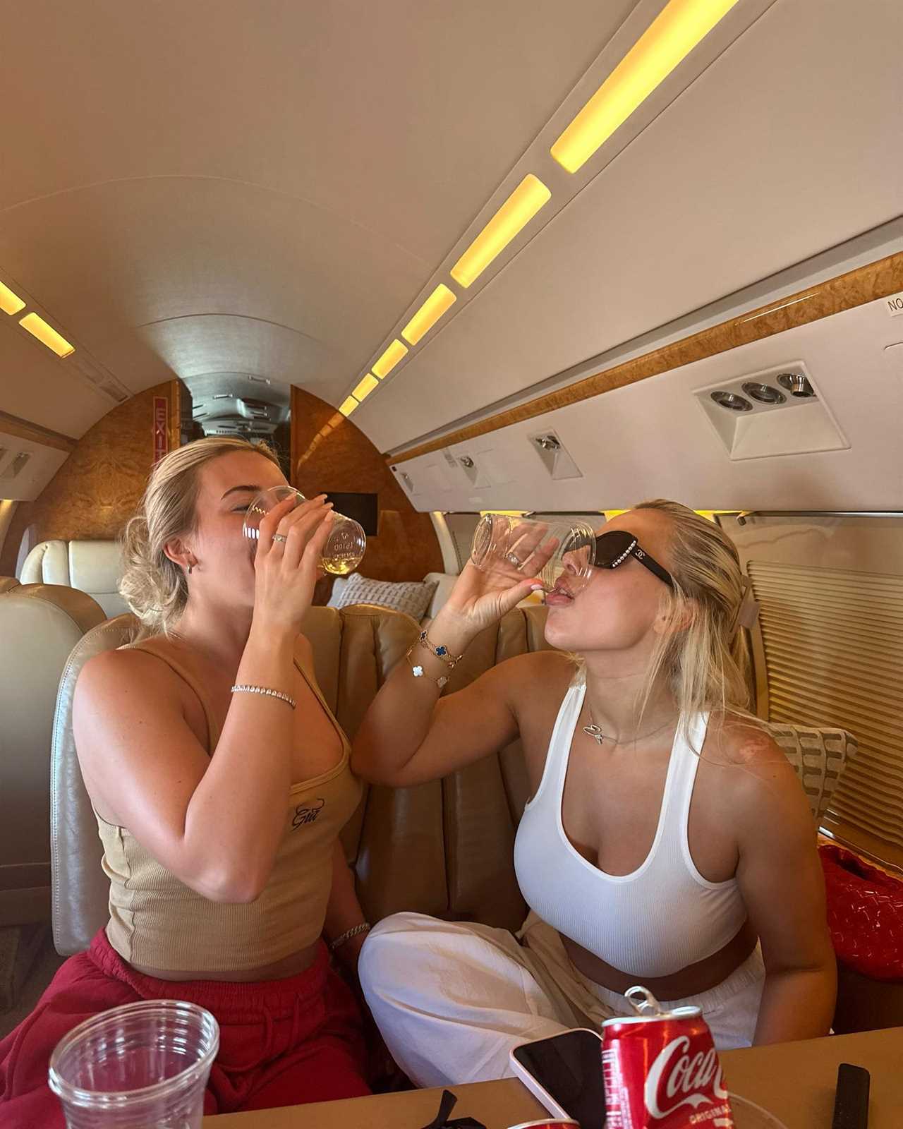 Love Island’s Ellie Brown wows in bikini as she boards private jet with co-star