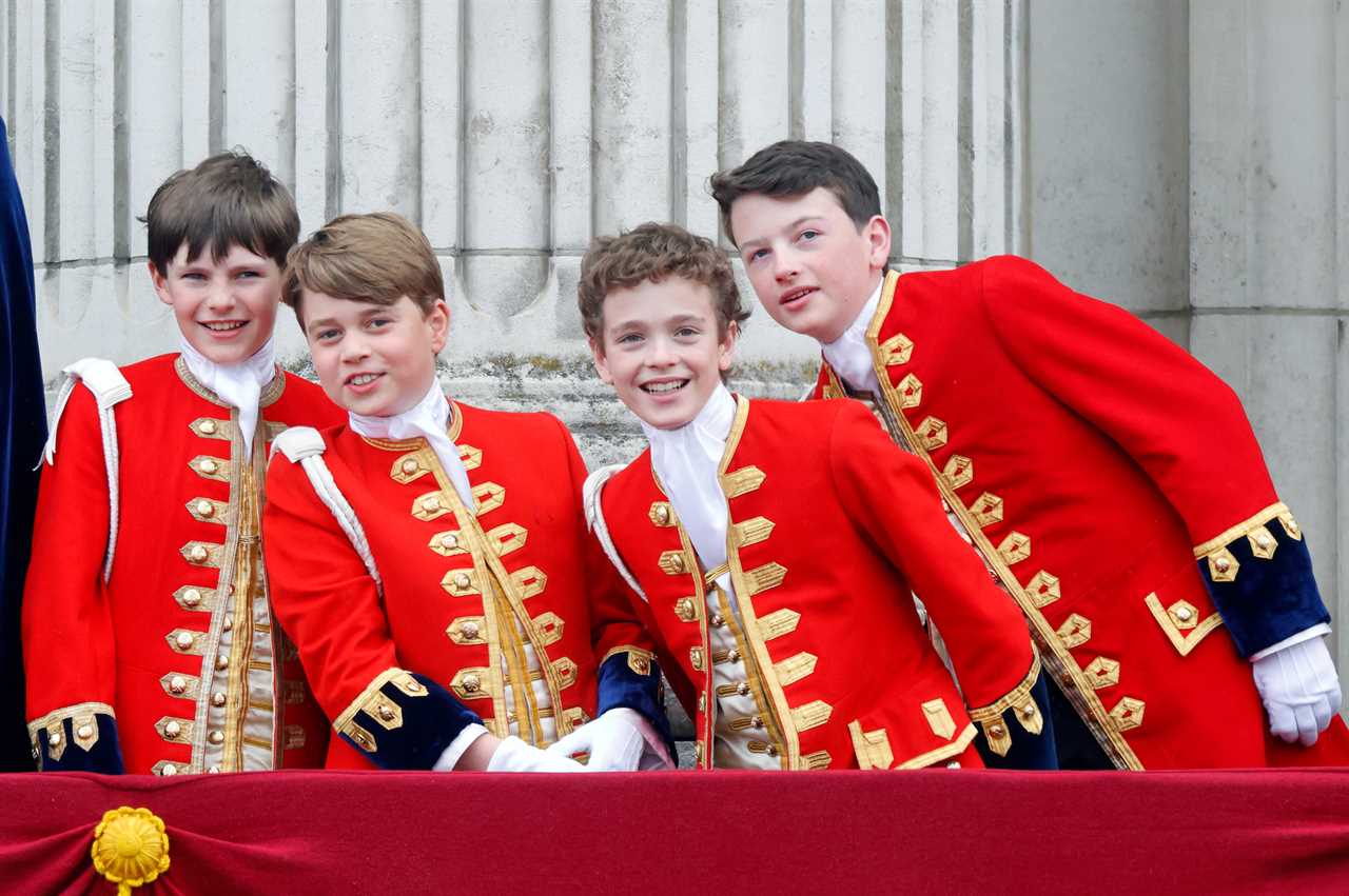 LONDON, UNITED KINGDOM - MAY 06: (EMBARGOED FOR PUBLICATION IN UK NEWSPAPERS UNTIL 24 HOURS AFTER CREATE DATE AND TIME) Page of Honour Ralph Tollemache, Prince George of Wales (in his role as Page of Honour), Page of Honour Lord Oliver Cholmondeley and Page of Honour Nicholas Barclay watch an RAF flypast from the balcony of Buckingham Palace following the Coronation of King Charles III & Queen Camilla at Westminster Abbey on May 6, 2023 in London, England. The Coronation of Charles III and his wife, Camilla, as King and Queen of the United Kingdom of Great Britain and Northern Ireland, and the other Commonwealth realms takes place at Westminster Abbey today. Charles acceded to the throne on 8 September 2022, upon the death of his mother, Elizabeth II. (Photo by Max Mumby/Indigo/Getty Images)