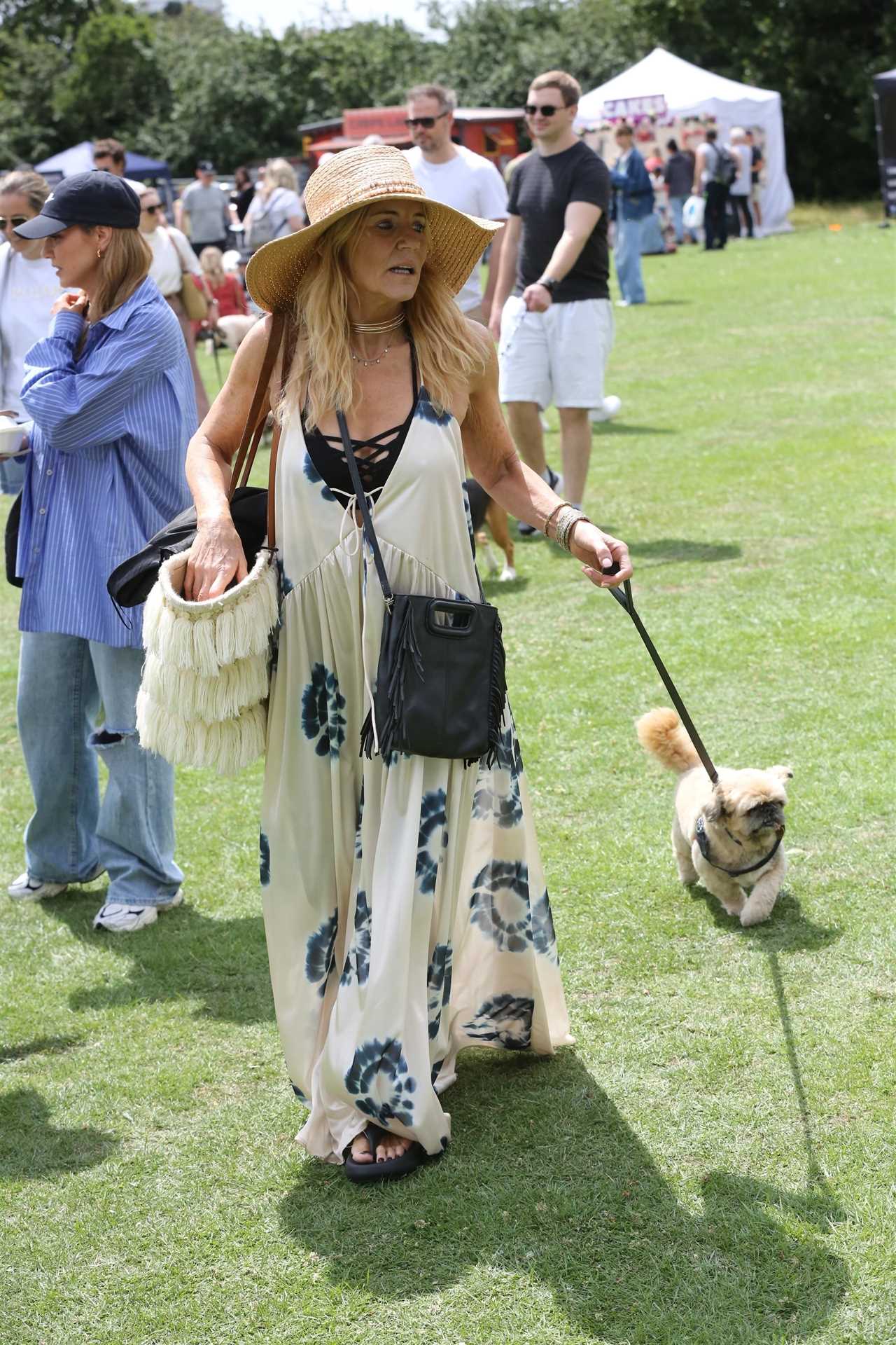 EastEnders’ Michelle Collins looked incredible as she enjoyed the sun at a dog show