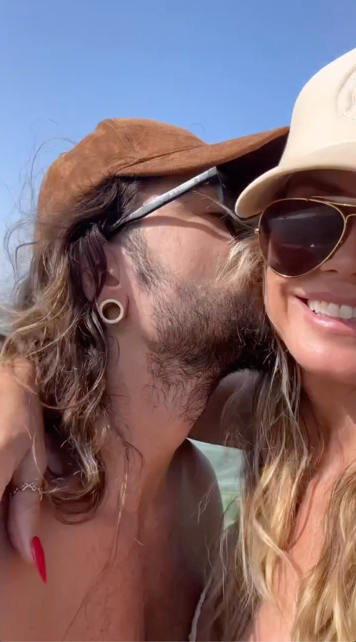 AGT’s Heidi Klum flaunts figure in thong bikini as star grabs husband Tom Kaulitz’s butt during steamy makeout session