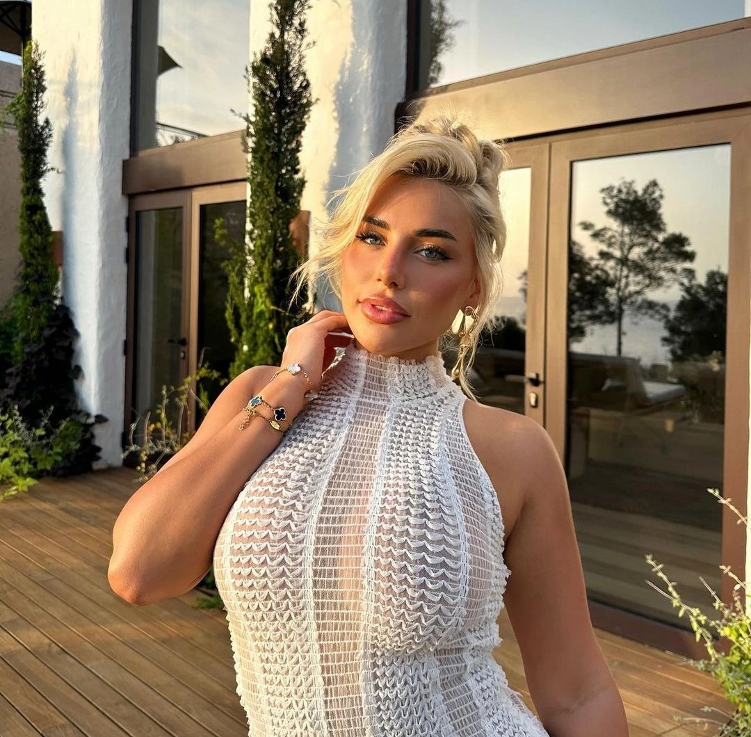 Love Island’s Ellie Brown stuns as she goes braless in see-through dress in Ibiza