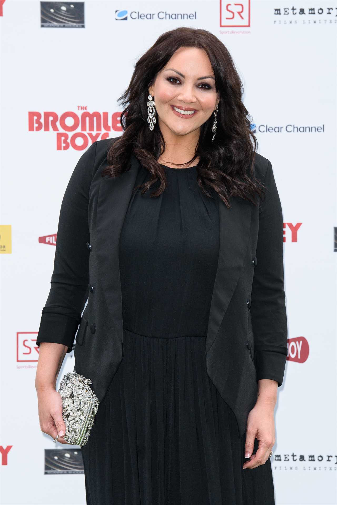 EastEnders legend Martine McCutcheon looks slimmer than ever in white and blue summer dress