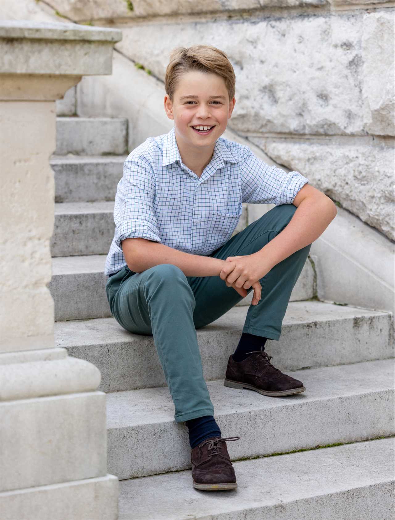 Prince George flashes a cheeky smile in adorable photo released for the future King’s 10th birthday