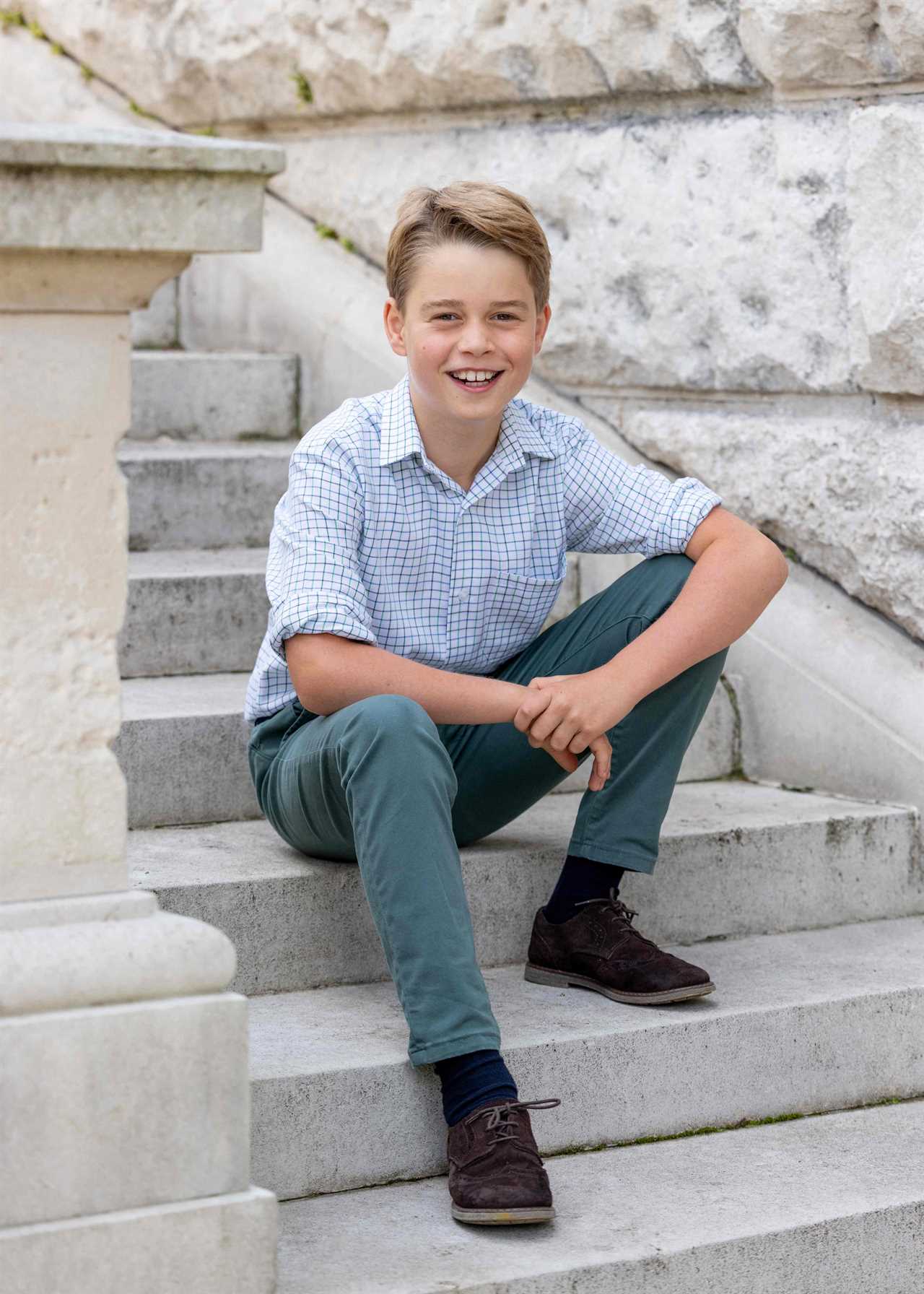 A handout photo taken in July 2023 and issued by Kensington Palace on July 22, 2023 shows Britain's Prince George of Wales posing for a photograph in Windsor, west of London. The portrait has been released to mark Prince George's 10th birthday. (Photo by Millie Pilkington / KENSINGTON PALACE / AFP) / RESTRICTED TO EDITORIAL USE - MANDATORY CREDIT "AFP PHOTO / KENSINGTON PALACE PALACE / MILLIE PILKINGTON " - NO MARKETING NO ADVERTISING CAMPAIGNS - DISTRIBUTED AS A SERVICE TO CLIENTS - IMAGE ON TO BE USED TO ILLUSTRATE STORY MENTIONED IN CAPTION This photograph can not be used after 0001 Tuesday December 31, 2023, without prior, written permission from Kensington Palace. / (Photo by MILLIE PILKINGTON/KENSINGTON PALACE/AFP via Getty Images)