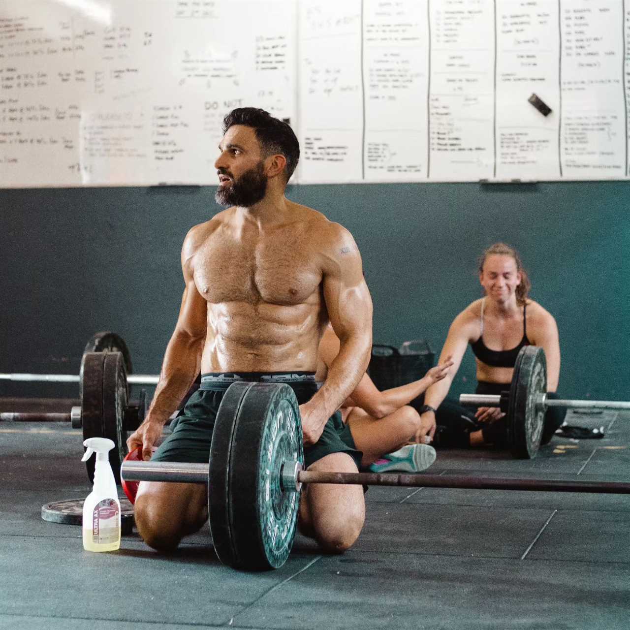 EastEnders star Davood Ghadami looks worlds away from Albert Square as he shows off ripped body and new beard