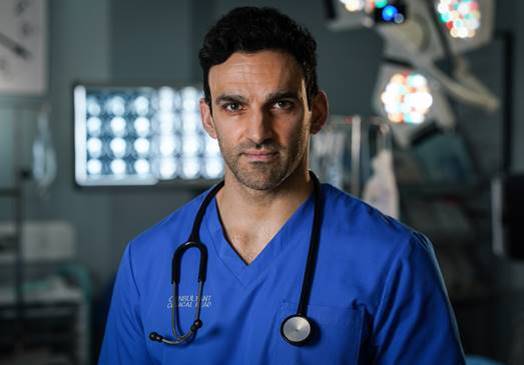 EastEnders star Davood Ghadami looks worlds away from Albert Square as he shows off ripped body and new beard