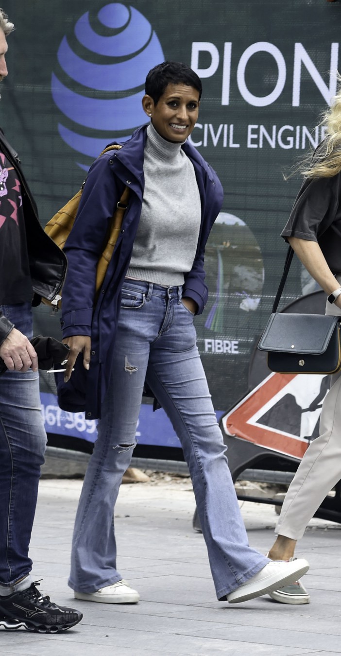 EXCLUSIVE: BBC Breakfast Presenter Naga Munchetty looks a picture of health after recent hospital dash. She is spotted chatting to friends in Manchester city centre whilst smoking a cigarette. Pictured: Naga Munchetty Ref: SPL9520429 270723 EXCLUSIVE Picture by: Aaron Parfitt / SplashNews.com Splash News and Pictures USA: 310-525-5808 UK: 020 8126 1009 eamteam@shutterstock.com World Rights