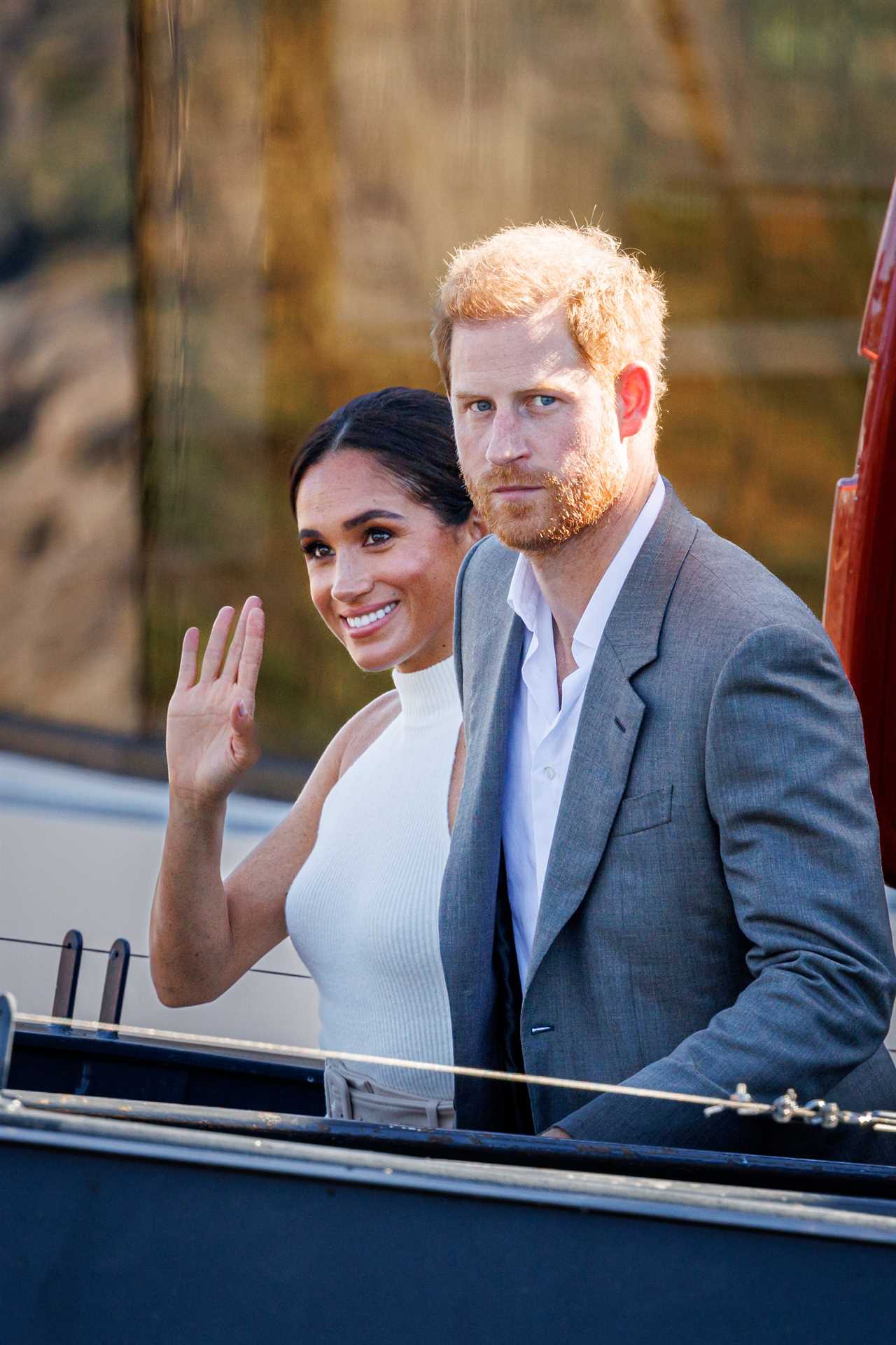 DUSSELDORF, GERMANY - SEPTEMBER 06: Prince Harry, Duke of Sussex and Meghan, Duchess of Sussex after a boat trip during the Invictus Games Dusseldorf 2023 - One Year To Go events on September 6, 2022 in Dusseldorf, Germany. The Invictus Games will be held in Germany for the first time in September 2023. (Photo by Patrick van Katwijk/Getty Images)