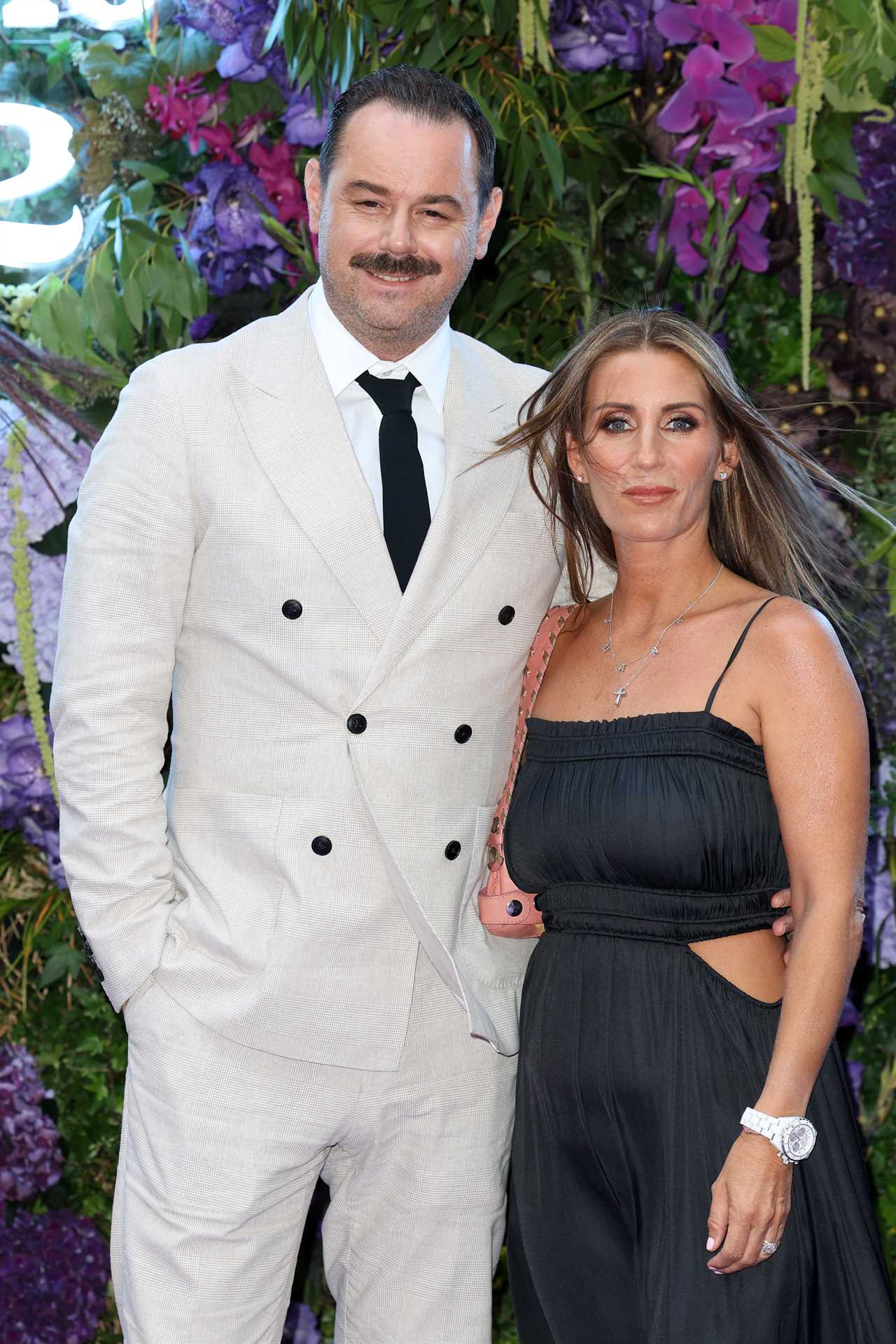 EastEnders star Danny Dyer looks worlds away from Albert Square with new moustache on glam night with wife Jo