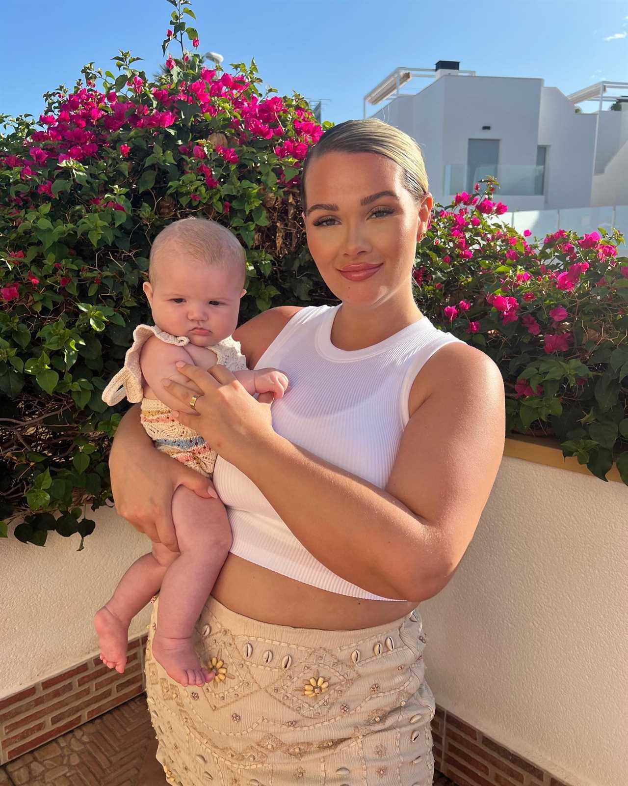 Love Island’s Shaughna Phillips shows off her curves in orange bikini three months after giving birth