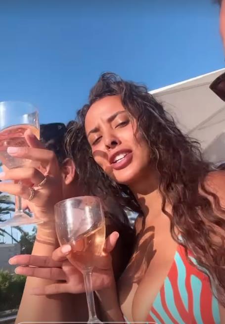 Maya Jama wows in bikini and downs wine while singing Whitney’s rap just days before Love Island final