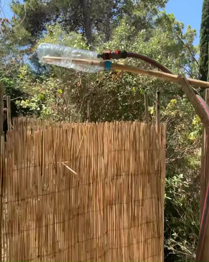 Brendan Cole builds an outdoor shower out of rocks after revealing whole family are living in a tent in Mallorca