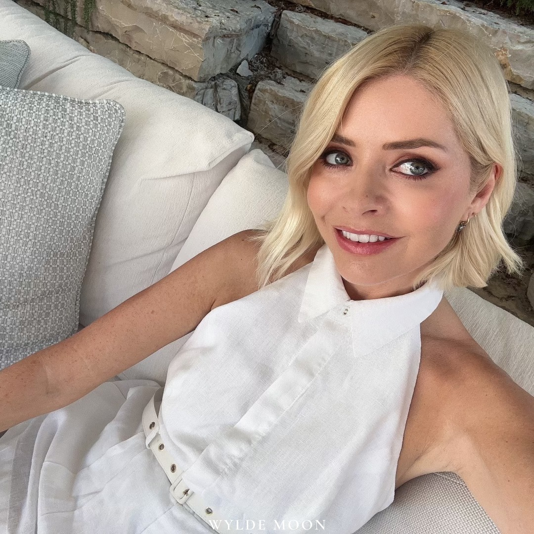 Holly Willoughby sends fans wild with sexy smoky-eyed selfie as she slips into white summer dress