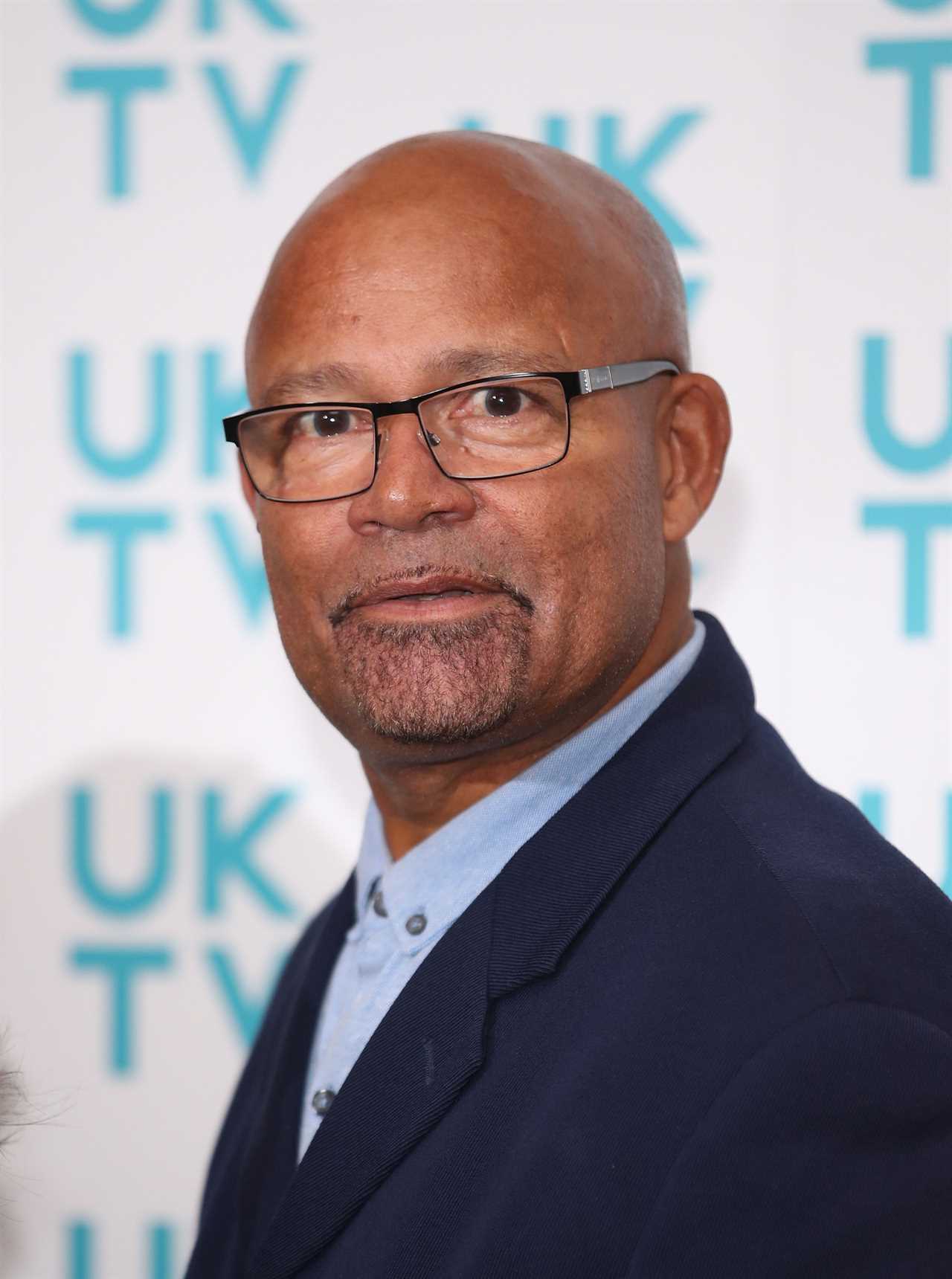 Corrie star Louis Emerick working in a charity shop as he carries out community service