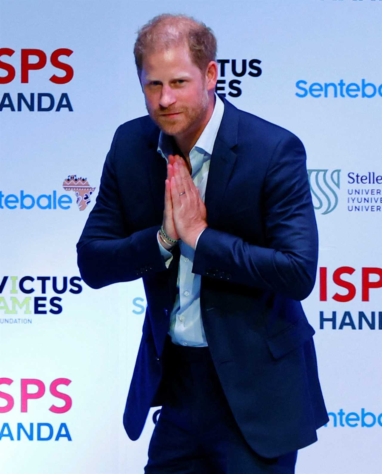 Prince Harry seen for first time since HRH title removed from Royal Family website – but confusion remains over Meghan