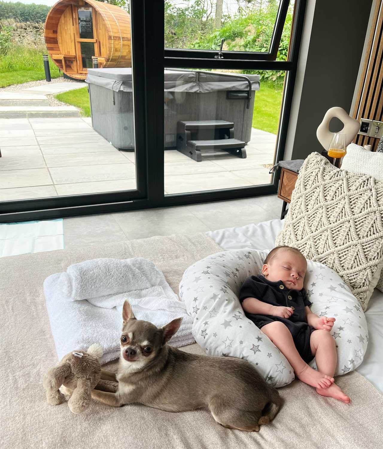 Inside Scarlett Moffatt’s £300 a night staycation with newborn son at stunning lodge with sauna and hot tub