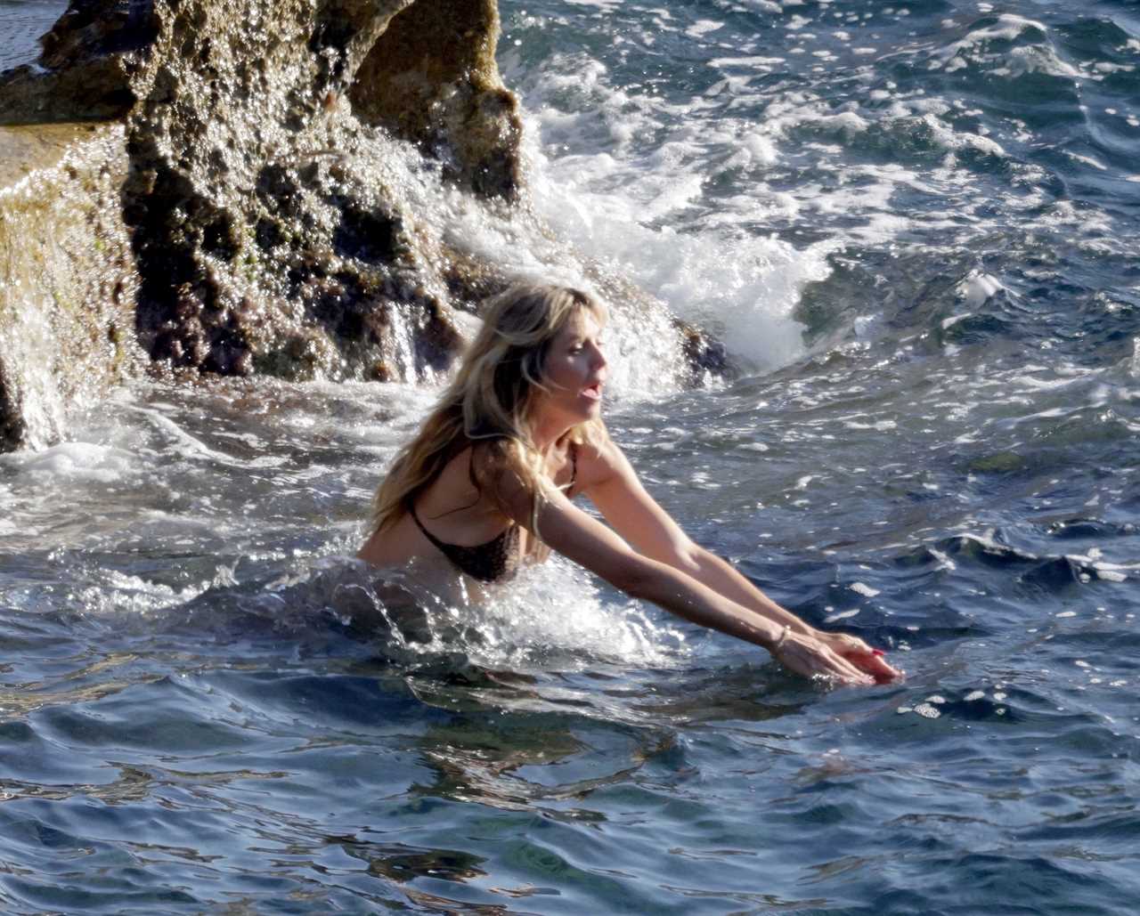 AGT’s Heidi Klum goes topless as husband Tom Kaulitz grabs her butt in NSFW unedited photos on steamy Italian getaway