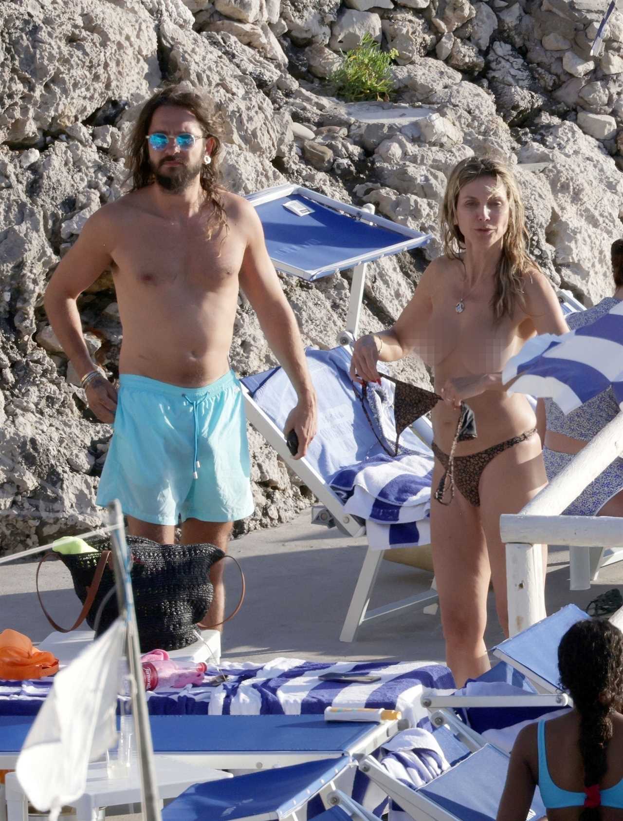 AGT’s Heidi Klum goes topless as husband Tom Kaulitz grabs her butt in NSFW unedited photos on steamy Italian getaway